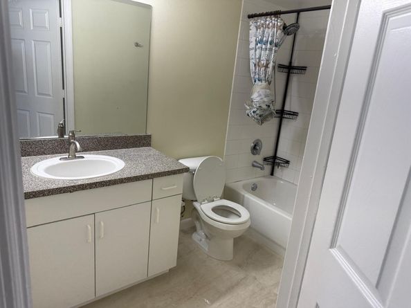 5061 Wiles Rd 202, Coconut Creek FL 33073