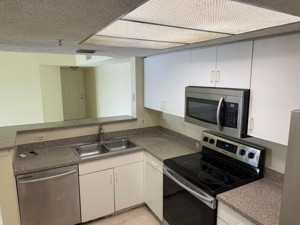 5061 Wiles Rd 202, Coconut Creek FL 33073