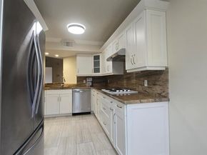 8871 Wiles Road 202, Coral Springs FL 33067