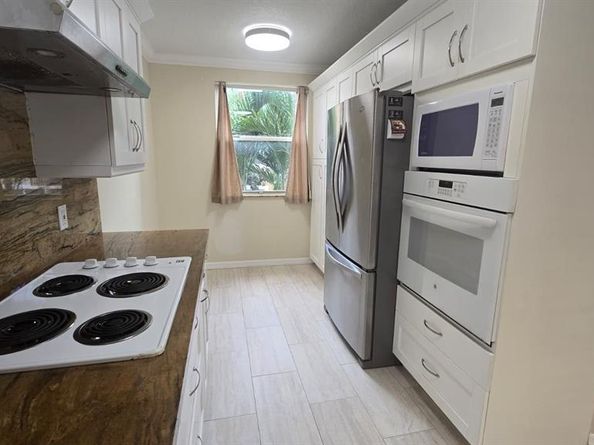 8871 Wiles Road 202, Coral Springs FL 33067