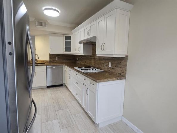8871 Wiles Road 202, Coral Springs FL 33067