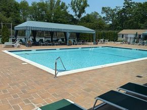 108 Hidden Ponds Circle, Smithtown NY 11787