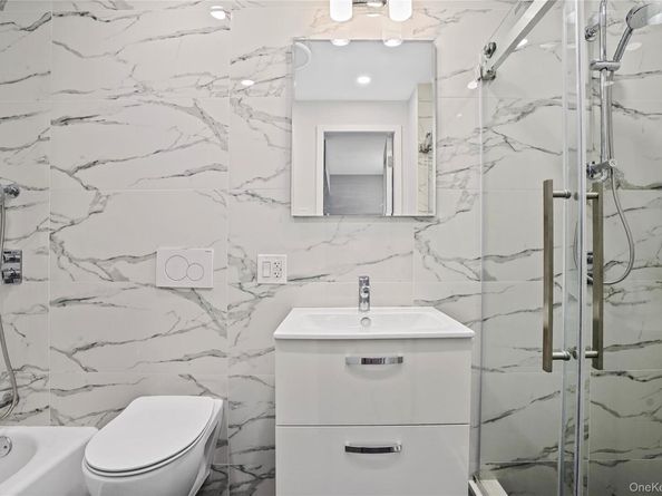 79-23 67 Drive, Middle Village NY 11379