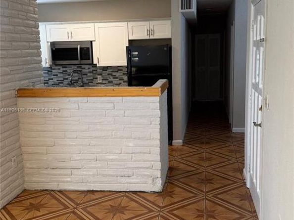 Undisclosed Address #A11926169, Miami Gardens FL 33169