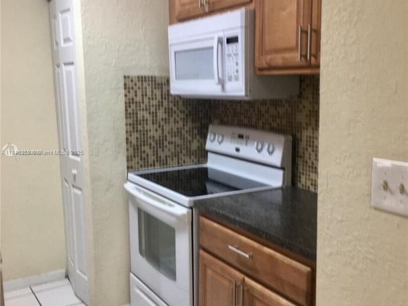 15675 SW 74th Circle Dr 14, Miami FL 33193