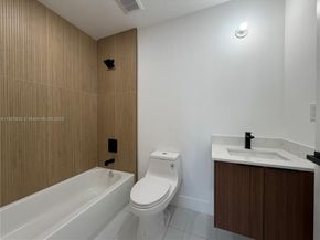 1037 NW 2nd St, Miami FL 33128