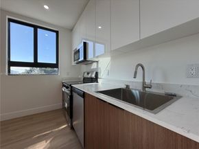 1037 NW 2nd St, Miami FL 33128