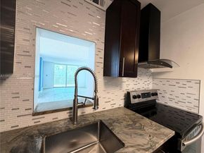 3660 NE 166th St 301 +40' Deeded Dock, North Miami Beach FL 33160