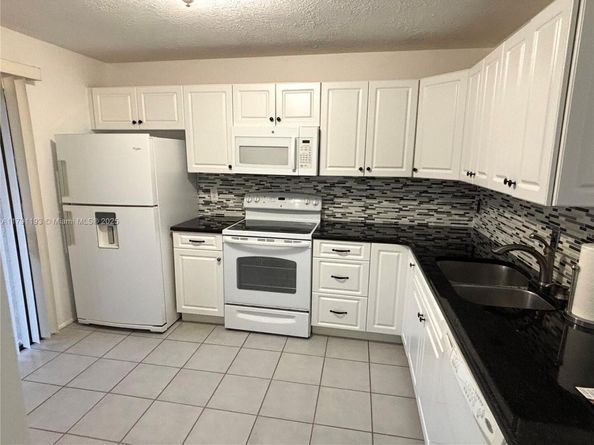 120 Roselle Ct, Royal Palm Beach FL 33411