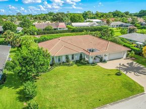 524 Muirfield Dr, Atlantis FL 33462