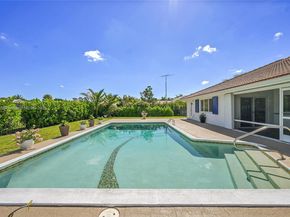 524 Muirfield Dr, Atlantis FL 33462