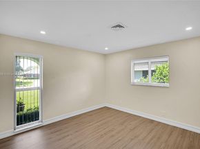 524 Muirfield Dr, Atlantis FL 33462