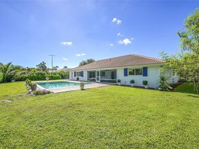 524 Muirfield Dr, Atlantis FL 33462