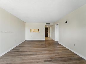 496 NW 165th St Rd D211, Miami FL 33169