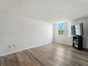 496 NW 165th St Rd D211, Miami FL 33169