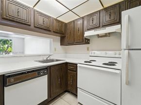 496 NW 165th St Rd D211, Miami FL 33169