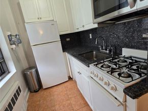 99-40 63rd Road 1O, Rego Park NY 11374