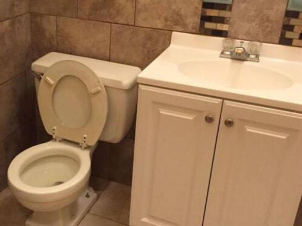 8716 104th Street, Richmond Hill NY 11418