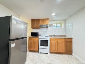 9915 202nd Street, Hollis NY 11423