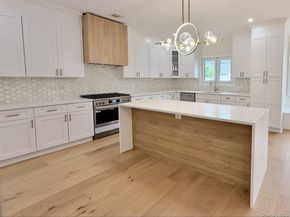 60 Periwinkle Road, Levittown NY 11756