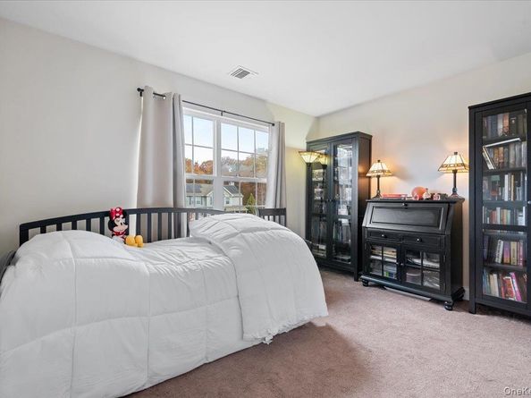 64 E Margin Road, Ridge NY 11961