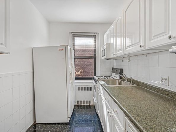 96-11 65 Road 501, Rego Park NY 11374