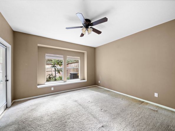 150 N Magnolia Pond Place, The Woodlands TX 77381