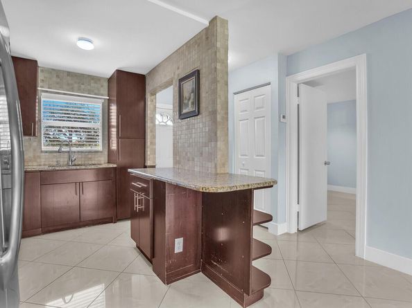 9851 Sandalfoot Boulevard 207, Boca Raton FL 33428