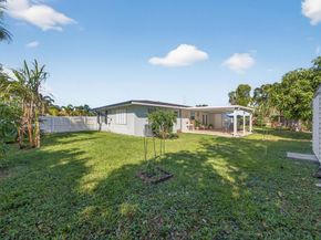 7026 Pine Tree Lane, Lake Clarke Shores FL 33406