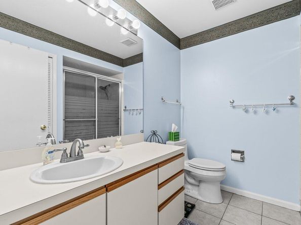 77 Ironwood Way N, Palm Beach Gardens FL 33418