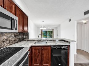 2220 N Cypress Bend Dr 310, Pompano Beach FL 33069