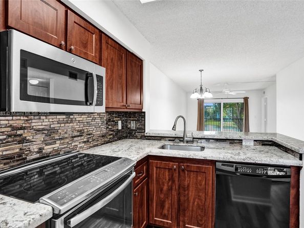 2220 N Cypress Bend Dr 310, Pompano Beach FL 33069