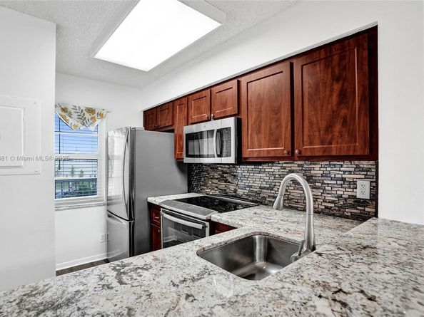 2220 N Cypress Bend Dr 310, Pompano Beach FL 33069