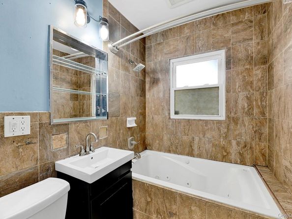 94 Woods Avenue, Roosevelt NY 11575