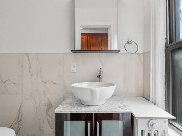 64-38 84th Street, Middle Village NY 11379