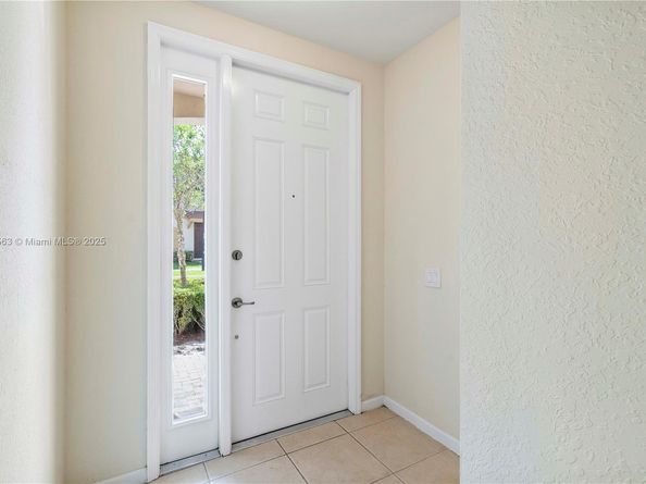 6116 E Grand Cypress Cir E, Coconut Creek FL 33073