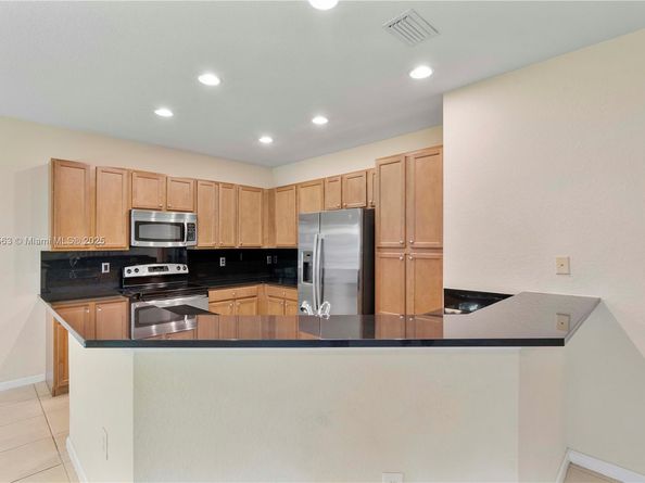 6116 E Grand Cypress Cir E, Coconut Creek FL 33073