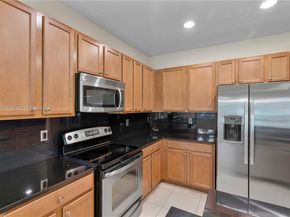 6116 E Grand Cypress Cir E, Coconut Creek FL 33073