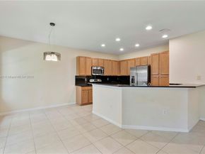 6116 E Grand Cypress Cir E, Coconut Creek FL 33073