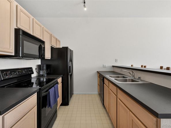 15475 Andrews Drive 406, Denver CO 80239