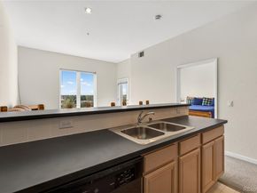 15475 Andrews Drive 406, Denver CO 80239