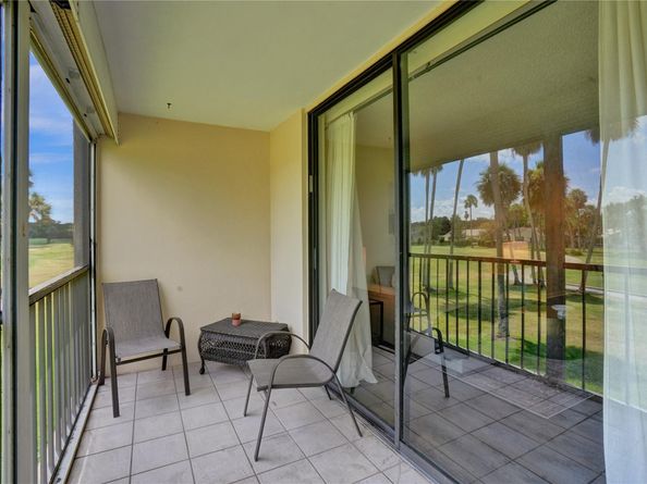 2410 Deer Creek Country Club Blvd 202E, Deerfield Beach FL 33442