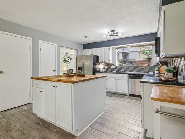 5210 Creek Shadows Drive, Houston TX 77339