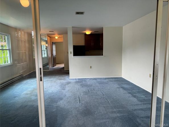 406 Woodbridge Drive A, Ridge NY 11961