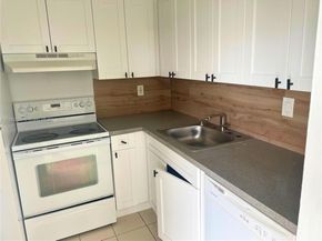 498 NW 165th St Rd D601, Miami FL 33169