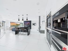 7141 Woodrow Wilson Drive, Los Angeles CA 90068