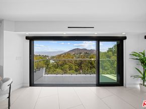 7141 Woodrow Wilson Drive, Los Angeles CA 90068