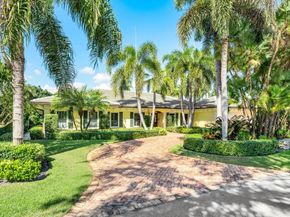 1851 Thatch Palm Drive, Boca Raton FL 33432