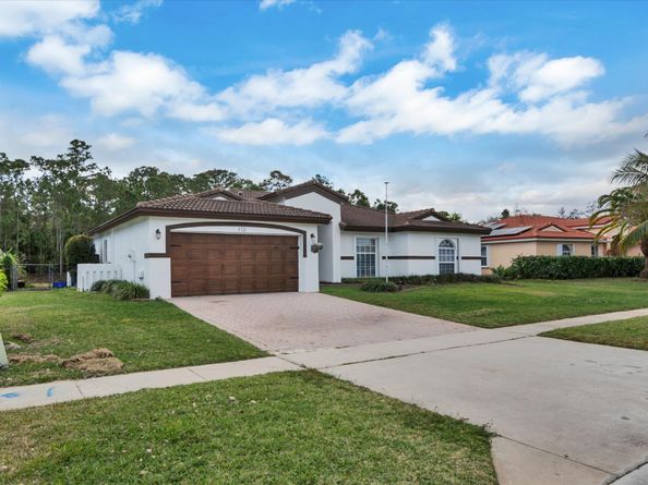 112 Cocoplum Circle, Royal Palm Beach FL 33411