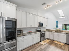 703 Saint Giles Court, Palm Beach Gardens FL 33418
